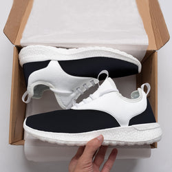 The Black New White sneakers by New Unique Stuff have a shoe box feature with the top of the shoe being black from the heel to the tongue and the eyestay where the laces are set. However, the laces, the trimming, the collar, and the strap remain white, making them look sensational.