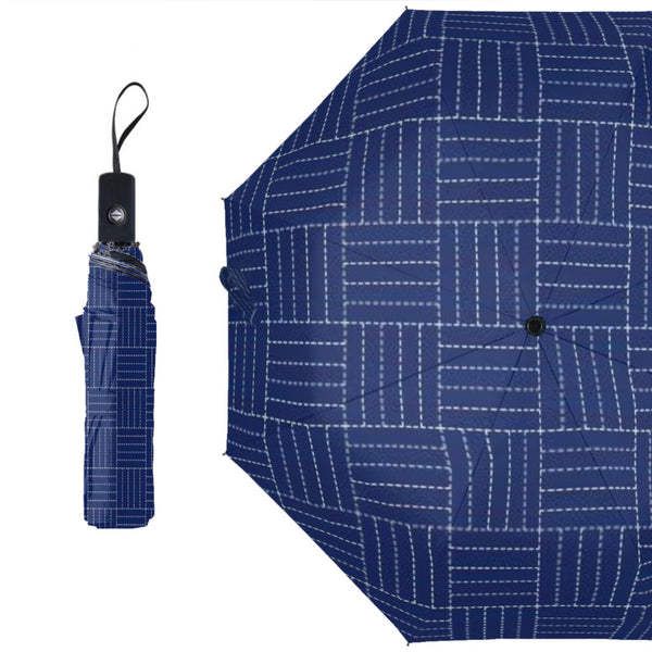 The Blue-Dash Umbrella by New Unique Stuff is portable and has a cute cover to match the umbrella design.