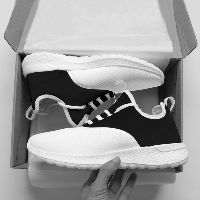 The Black New White sneakers by New Unique Stuff have a shoe box feature with the top of the shoe being black from the heel to the tongue and the eyestay where the laces are set. However, the laces, the trimming, the collar, and the strap remain white, making them look sensational.